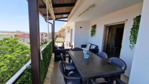 Uma varanda ou terraço em Blue Horizon Calabria - Seaside Apartment 120m to the Beach - Air conditioning - Wi-Fi - View - Free Parking