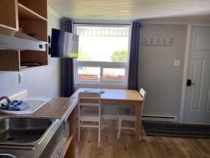 Dapur atau dapur kecil di Chalets Glenn