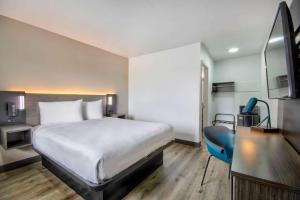 TV a/nebo společenská místnost v ubytování Motel 6-Austin, TX - North