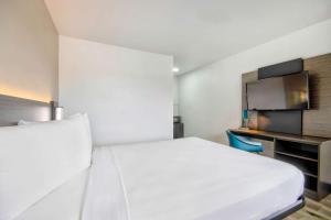 TV a/nebo společenská místnost v ubytování Motel 6-Austin, TX - North