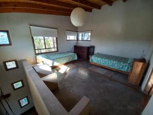 an overhead view of a bedroom with two beds at Casas Piedra del Sol in Costa del Este