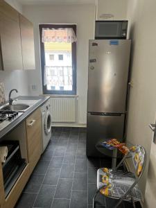 Een keuken of kitchenette bij Apartment Hannover