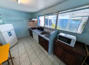 Una cocina o kitchenette en Résidence La Clément