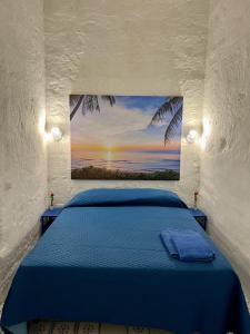 Ένα ή περισσότερα κρεβάτια σε δωμάτιο στο MAMY Sweet Home