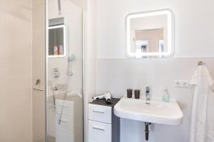 Ένα μπάνιο στο Apartment "Sanddorn" - Haffresidenz +26 φωτογραφίες