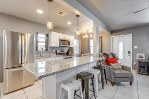 a kitchen with a large counter and a refrigerator at Pet-Friendly Phoenix Vacation Rental Near Downtown in Phoenix
