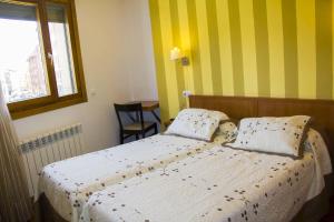 Postel nebo postele na pokoji v ubytování Rincón de Gala