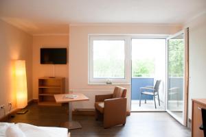 Μια τηλεόραση ή/και κέντρο ψυχαγωγίας στο Apartmenthaus Wesertor