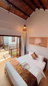 Postel nebo postele na pokoji v ubytování The Poplar Resort Phú Quốc