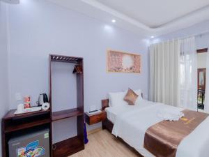 Postel nebo postele na pokoji v ubytování The Poplar Resort Phú Quốc