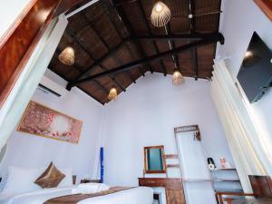 TV a/nebo společenská místnost v ubytování The Poplar Resort Phú Quốc