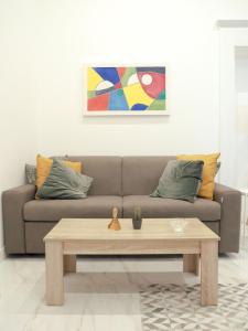 a living room with a couch and a coffee table at SANTACROCE8 in Torre del Greco