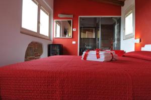 سرير أو أسرّة في غرفة في Bed & Breakfast Viziottavo