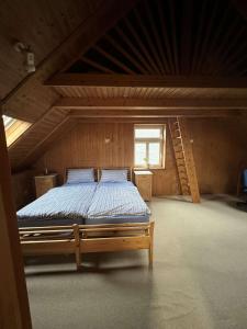 a bedroom with a bed in a attic at Attraktiver Luftkurort Winterberg in Winterberg