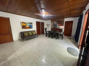 a living room with a couch and a table at oportunidad hermoso apartamento en santamarta 2b in Santa Marta