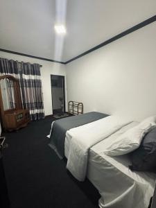 Postel nebo postele na pokoji v ubytování The Shrewsbury Bungalow