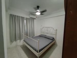 Llit o llits en una habitació de NAHARA HOMESTAY