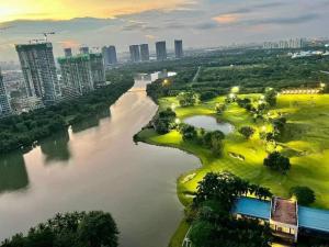 an aerial view of a river and a city at Homestay xinh Ecopark in HÆ°ng YÃªn