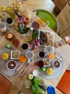 a table with a bunch of food on it at Corps Au Coeur in Montana