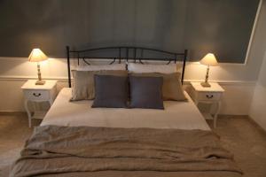 Cama o camas de una habitación en Scalilla Palace