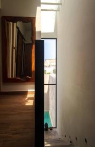 ภาพในคลังภาพของ Casa Dakini en la Punta with pool and ocean view ในปูแอร์โตเอสกอนดิโด