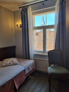 Krevet ili kreveti u jedinici u okviru objekta Taanilinna Hotell