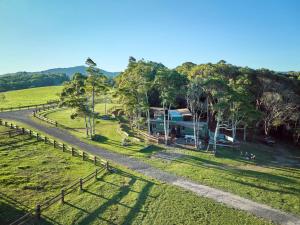 an aerial view of a rv in a field at KUR-Cow farm escape 35 minutes from Cairns in Kuranda