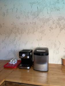 a coffee maker sitting on top of a counter at Romantic villa in the south of France with a private garden , pool and a terrace in Nice