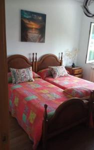 Postel nebo postele na pokoji v ubytování Casa con finca en Oviedo El Casero