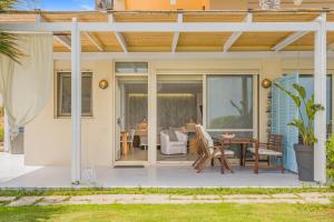 A patio or other outdoor area at Junior suite by the beach Stalida