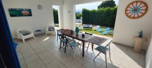 Гостиная зона в Pool Seaside Relais - VILLE Ninfea, Marea, Rosa e Cassiopea