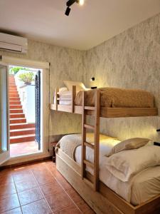 Posteľ alebo postele v izbe v ubytovaní BRISA DE CALELLA DE PALAFRUGELL