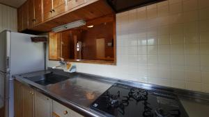 Η κουζίνα ή μικρή κουζίνα στο Villa Tora