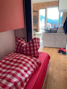 Postel nebo postele na pokoji v ubytování Studio 22 Veysonnaz