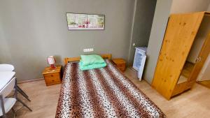 Postel nebo postele na pokoji v ubytování Happy Hostel