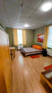 Postel nebo postele na pokoji v ubytování Happy Hostel