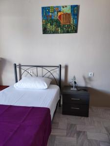 Postel nebo postele na pokoji v ubytování Sea View Apartments Poseidon