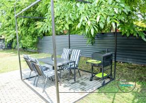 Vonkajšia záhrada v ubytovaní Cozy Apartment