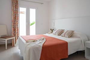 Sagitario Rymar Apartamentos客房内的一张或多张床位