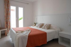 Sagitario Rymar Apartamentos客房内的一张或多张床位