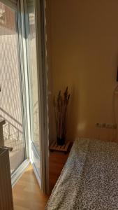 Postel nebo postele na pokoji v ubytování Apartman Ninolić