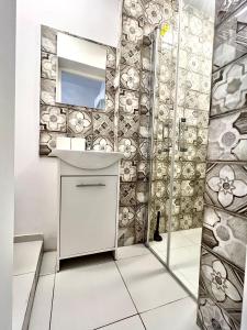 Et badeværelse på Familly Apartament 5