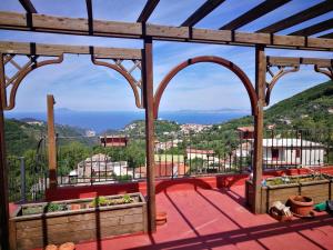 a view from the balcony of a house at La Petite Maison - Panoramic Apartment in Vico Equense