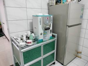 Kuhinja ili čajna kuhinja u objektu Happy Inn