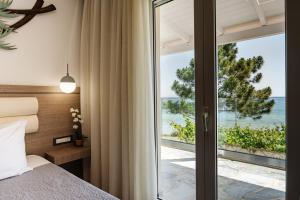 Posteľ alebo postele v izbe v ubytovaní Addimare Sea View Villa, and Events Venue + 21 fotografií