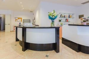 Kuchyň nebo kuchyňský kout v ubytování Hotel Altamarea