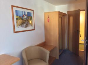 Ein Sitzbereich in der Unterkunft Gasthof Hotel Bauer
