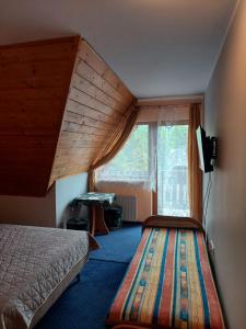 Postel nebo postele na pokoji v ubytování Pokoje gościnne Centrum Brzozowa 14 + 52 fotografií