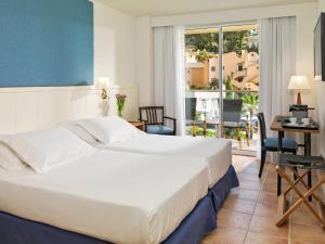Posteľ alebo postele v izbe v ubytovaní Boutique Hotel H10 Blue Mar - Adults Only