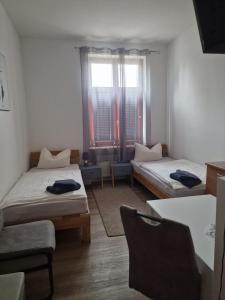 Postel nebo postele na pokoji v ubytování Unterkunft Greifswald + 13 fotografií